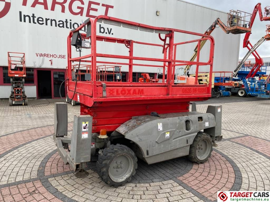 Haulotte Compact 12DX Diesel 4x4 Scissor Work Lift 1206cm  - Ollós emelő: 1 kép. Haulotte Compact 12DX Diesel 4x4 Scissor Work Lift 1206cm  - Ollós emelő: 1 kép.