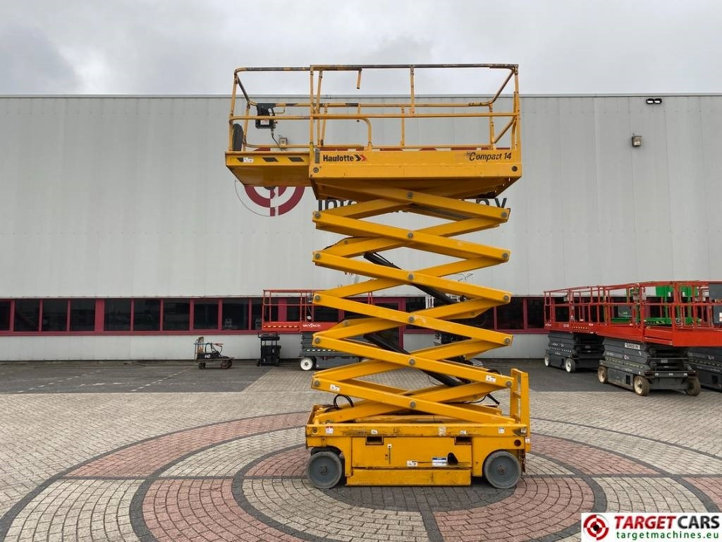 Haulotte Compact 14 Electric Scissor Work Lift 1385cm - Ollós emelő: 5 kép. Haulotte Compact 14 Electric Scissor Work Lift 1385cm - Ollós emelő: 5 kép.