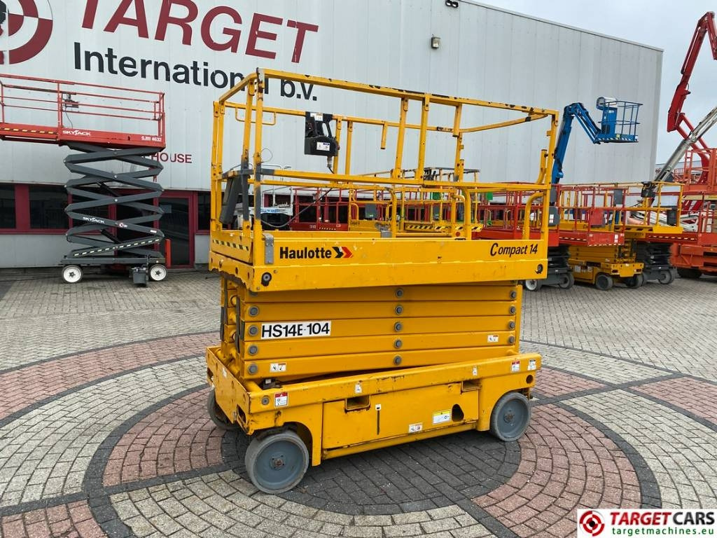 Haulotte Compact 14 Electric Scissor Work lift 1385cm - Ollós emelő: 1 kép. Haulotte Compact 14 Electric Scissor Work lift 1385cm - Ollós emelő: 1 kép.