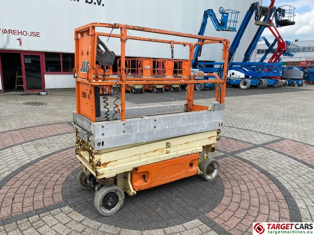 JLG 1930ES Electric Scissor Work Lift 772cm CE - Ollós emelő: 1 kép. JLG 1930ES Electric Scissor Work Lift 772cm CE - Ollós emelő: 1 kép.