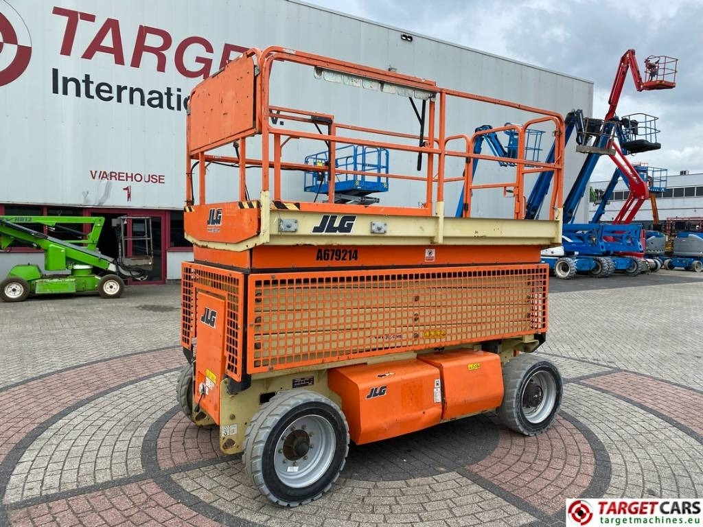 JLG 4069LE Electric Scissor Work Lift 1419cm - Ollós emelő: 1 kép. JLG 4069LE Electric Scissor Work Lift 1419cm - Ollós emelő: 1 kép.