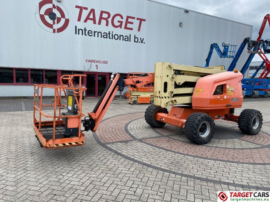 JLG 450AJ Articulated 4x4 Diesel Boom Work Lift 1572cm - Személyemelő: 1 kép. JLG 450AJ Articulated 4x4 Diesel Boom Work Lift 1572cm - Személyemelő: 1 kép.