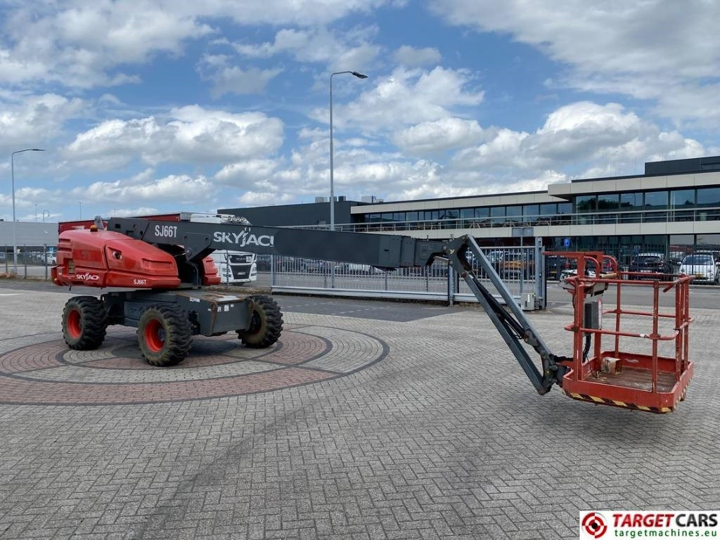SkyJack SJ66T Telescopic 4x4 Diesel Boom Work LIft 2212cm - Teleszkópos emelő: 2 kép. SkyJack SJ66T Telescopic 4x4 Diesel Boom Work LIft 2212cm - Teleszkópos emelő: 2 kép.