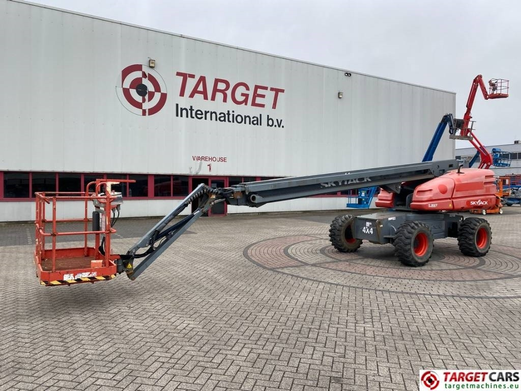 SkyJack SJ66T Telescopic 4x4 Diesel Boom Work Lift 2212cm - Teleszkópos emelő: 1 kép. SkyJack SJ66T Telescopic 4x4 Diesel Boom Work Lift 2212cm - Teleszkópos emelő: 1 kép.