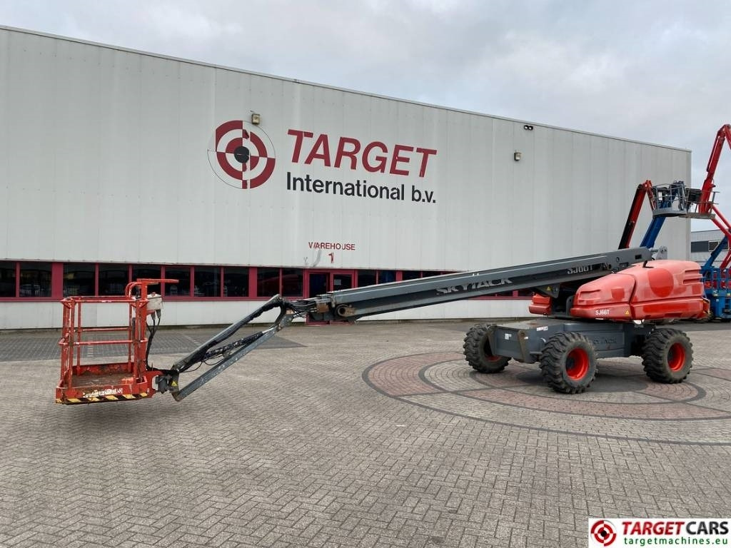 SkyJack SJ66T Telescopic 4x4 Diesel Boom Work Lift 2212cm - Teleszkópos emelő: 1 kép. SkyJack SJ66T Telescopic 4x4 Diesel Boom Work Lift 2212cm - Teleszkópos emelő: 1 kép.