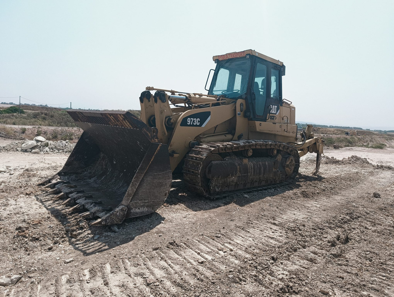 Caterpillar 973C Pala cingolata in ottime condizioni. - Lánctalpas homlokrakodó: 1 kép. Caterpillar 973C Pala cingolata in ottime condizioni. - Lánctalpas homlokrakodó: 1 kép.