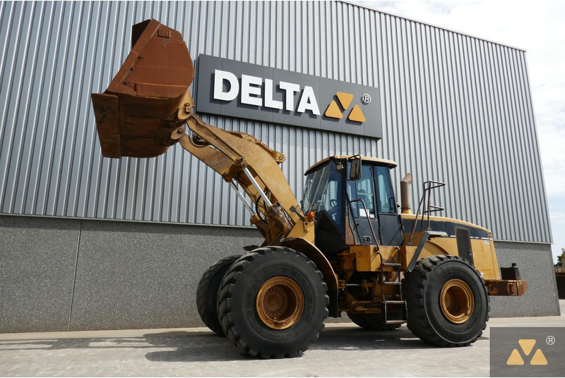 Caterpillar 966G Series II - Gumikerekes homlokrakodó: 3 kép. Caterpillar 966G Series II - Gumikerekes homlokrakodó: 3 kép.