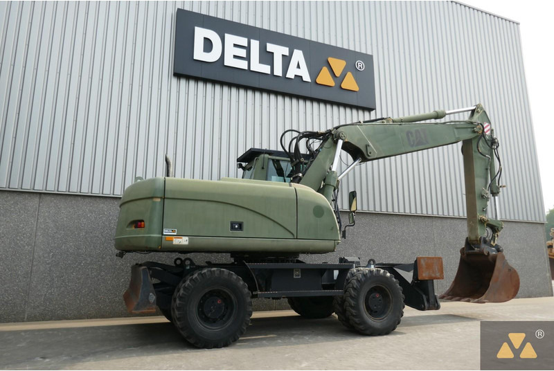 Caterpillar M318C Ex- - Gumikerekes kotró: 5 kép. Caterpillar M318C Ex- - Gumikerekes kotró: 5 kép.