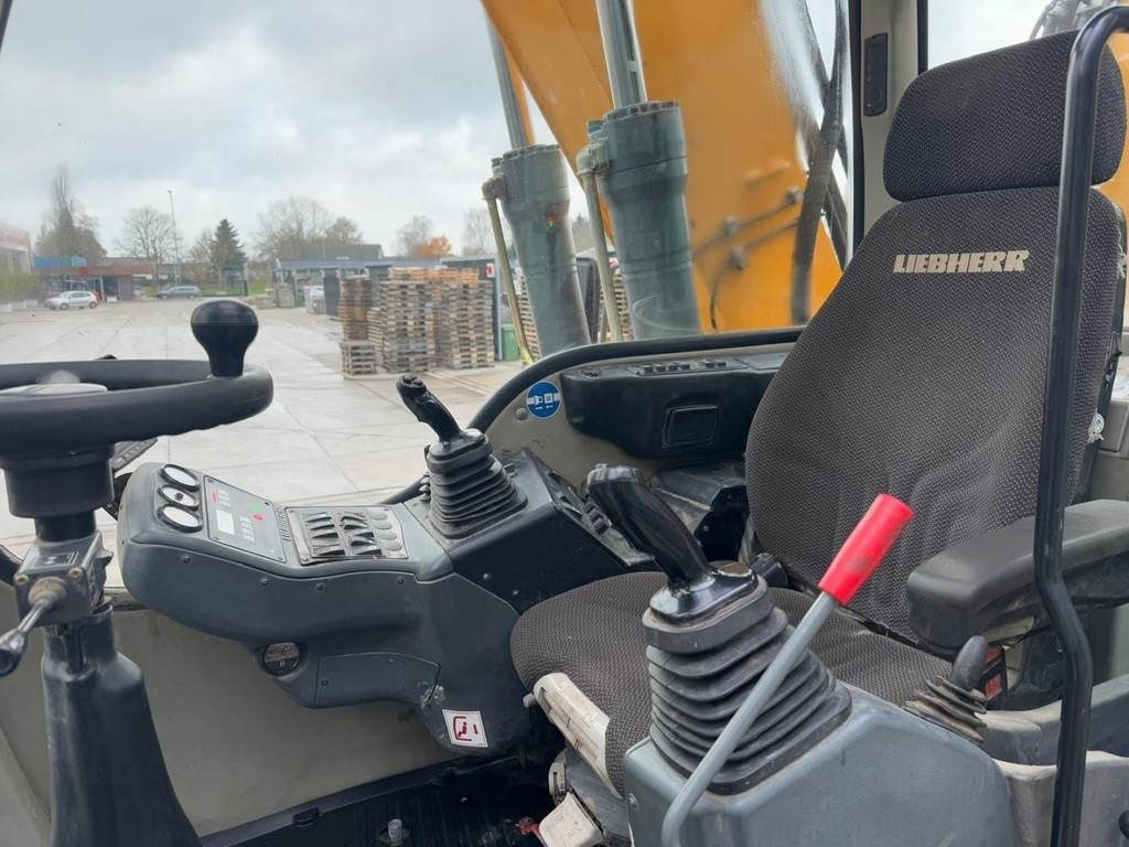 Hulladék kotró Liebherr A 316: 9 kép.