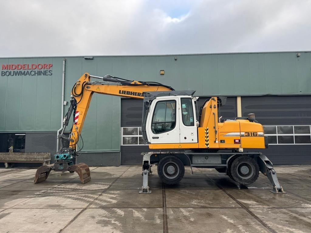 Liebherr A 316 - Hulladék kotró: 5 kép. Liebherr A 316 - Hulladék kotró: 5 kép.