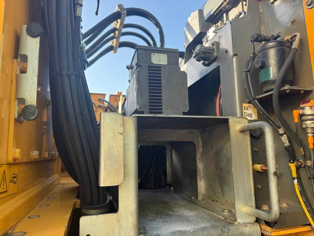 Hulladék kotró Liebherr A 934 C: 16 kép.