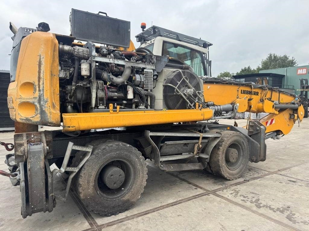 Liebherr LH 22 M - Hulladék kotró: 4 kép. Liebherr LH 22 M - Hulladék kotró: 4 kép.