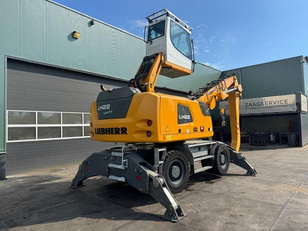 Liebherr LH 22 M - Hulladék kotró: 4 kép. Liebherr LH 22 M - Hulladék kotró: 4 kép.
