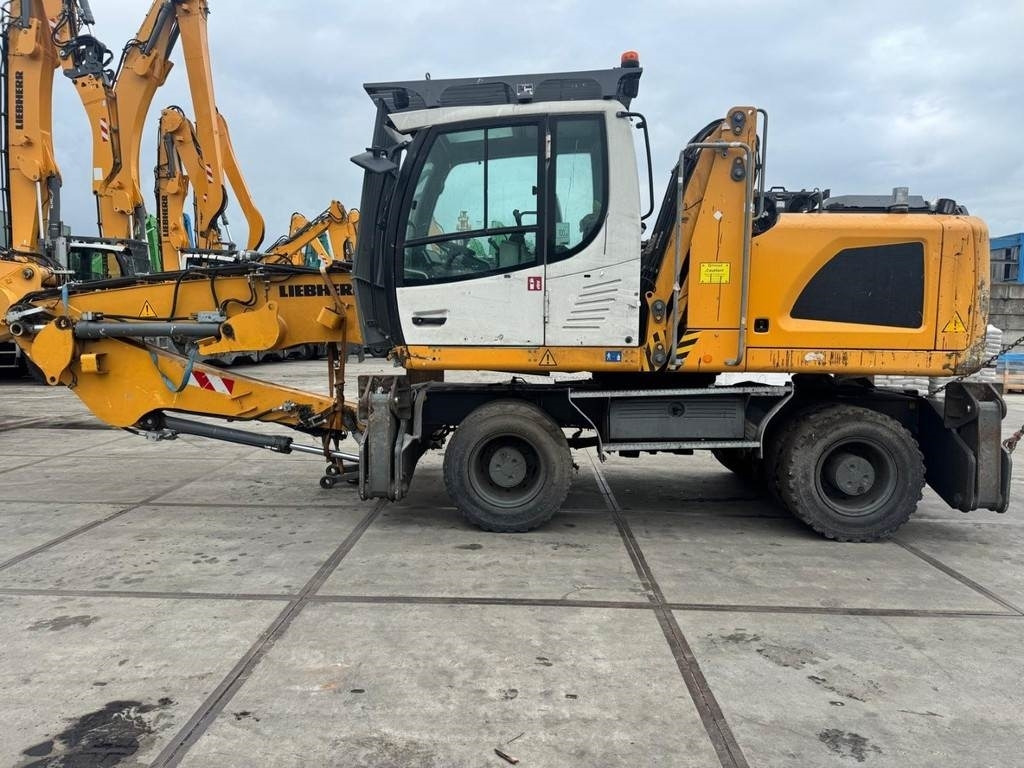 Liebherr LH 22 M - Hulladék kotró: 1 kép. Liebherr LH 22 M - Hulladék kotró: 1 kép.