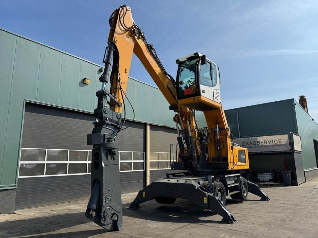 Liebherr LH 30 M - Hulladék kotró: 2 kép. Liebherr LH 30 M - Hulladék kotró: 2 kép.