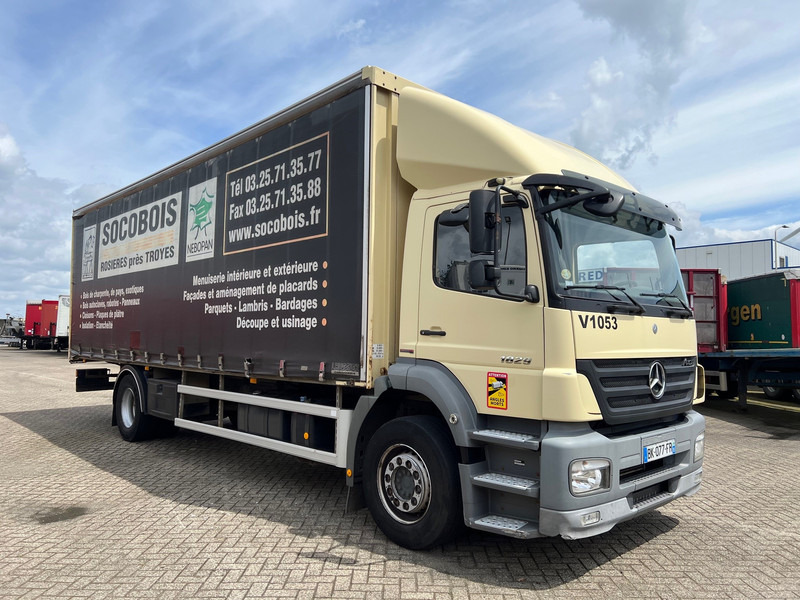 Mercedes-Benz Axor 1828 - Ponyvás teherautó: 3 kép. Mercedes-Benz Axor 1828 - Ponyvás teherautó: 3 kép.