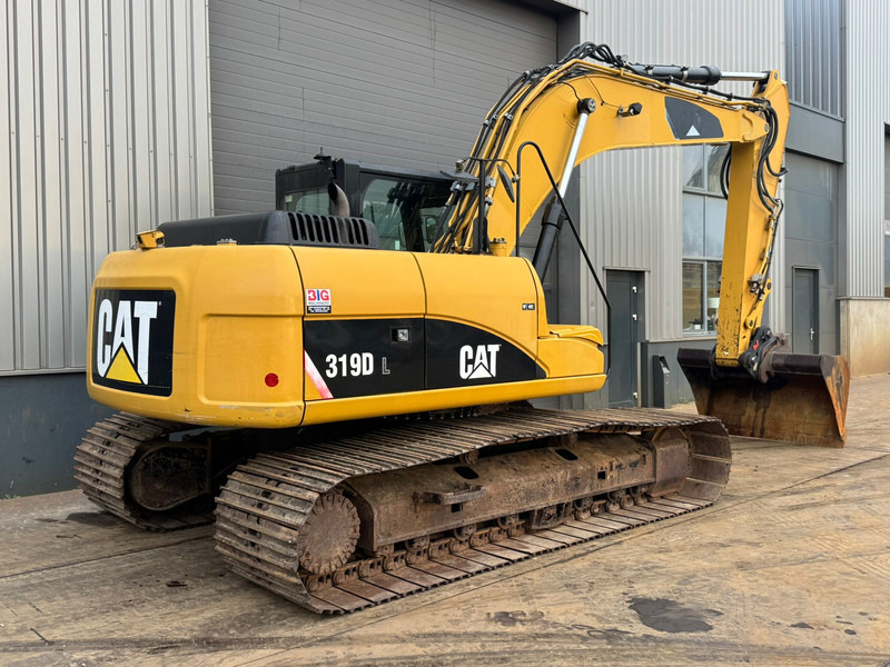 Caterpillar 319DL - Lánctalpas kotró: 5 kép. Caterpillar 319DL - Lánctalpas kotró: 5 kép.