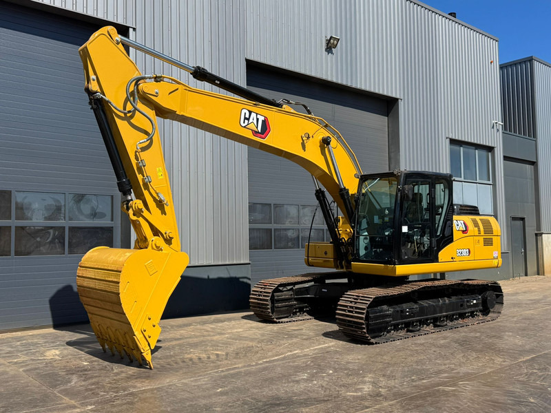 Caterpillar 323D3 - Lánctalpas kotró: 3 kép. Caterpillar 323D3 - Lánctalpas kotró: 3 kép.