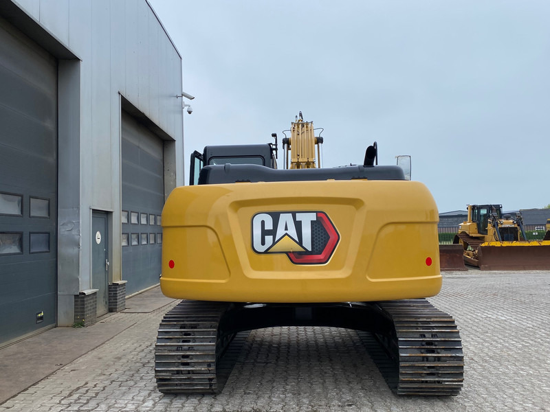 Caterpillar 323D3 - Lánctalpas kotró: 4 kép. Caterpillar 323D3 - Lánctalpas kotró: 4 kép.