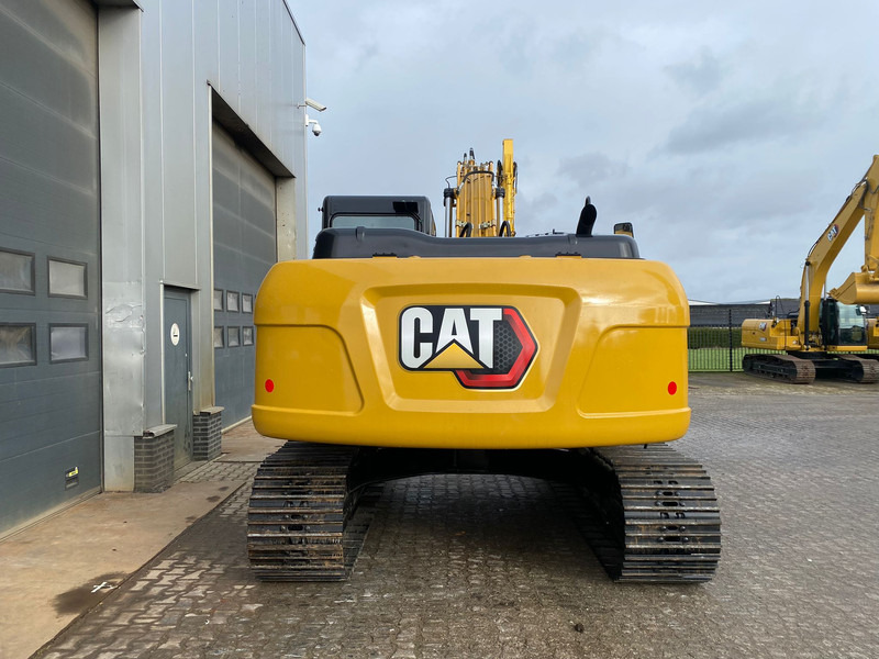 Caterpillar 323D3 - Lánctalpas kotró: 4 kép. Caterpillar 323D3 - Lánctalpas kotró: 4 kép.