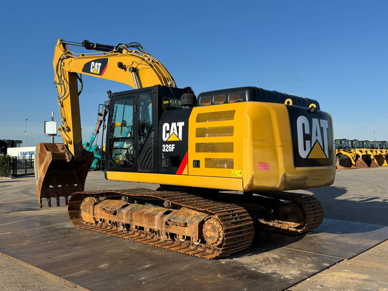 Caterpillar 326FL - Lánctalpas kotró: 3 kép. Caterpillar 326FL - Lánctalpas kotró: 3 kép.