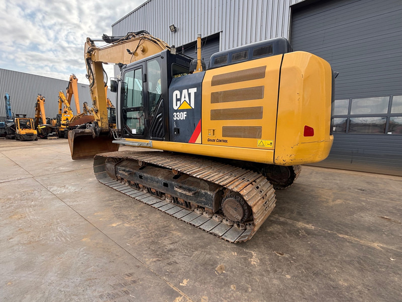 Caterpillar 330FL - Lánctalpas kotró: 3 kép. Caterpillar 330FL - Lánctalpas kotró: 3 kép.