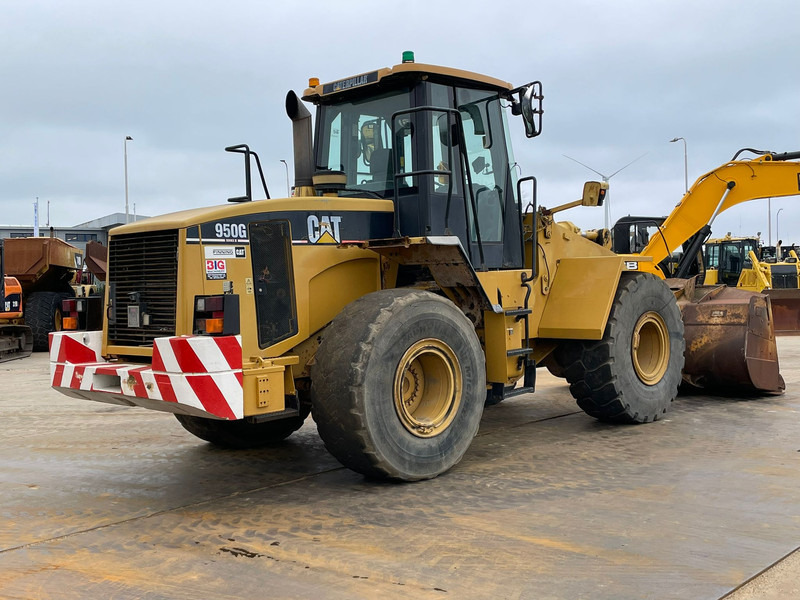 Caterpillar 950G - Gumikerekes homlokrakodó: 5 kép. Caterpillar 950G - Gumikerekes homlokrakodó: 5 kép.