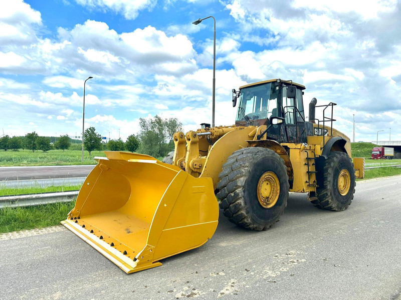Caterpillar 980H / New Bucket - Gumikerekes homlokrakodó: 2 kép. Caterpillar 980H / New Bucket - Gumikerekes homlokrakodó: 2 kép.