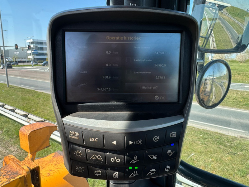 Gumikerekes homlokrakodó Hyundai HL970: 20 kép.