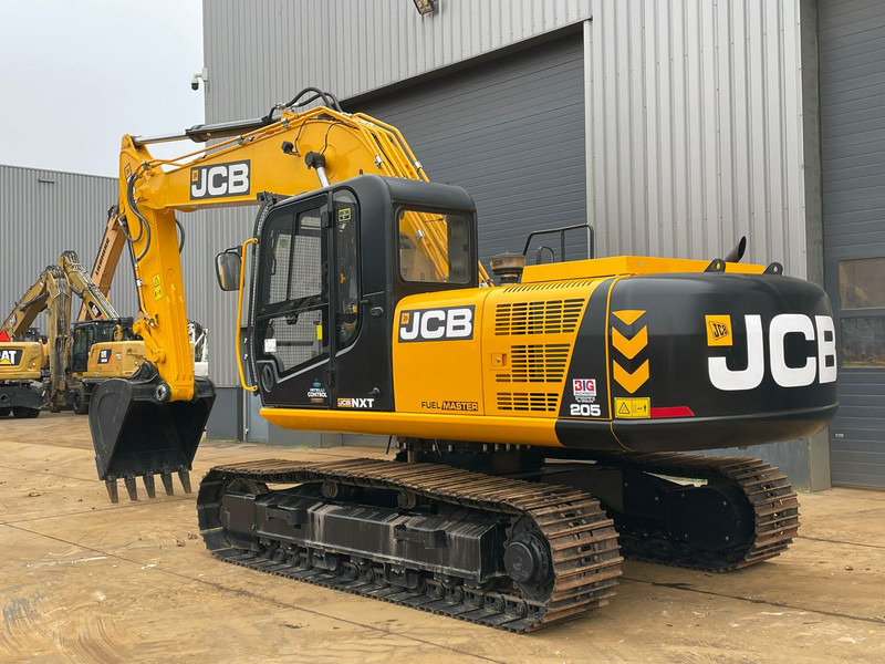 JCB 205 - Lánctalpas kotró: 3 kép. JCB 205 - Lánctalpas kotró: 3 kép.