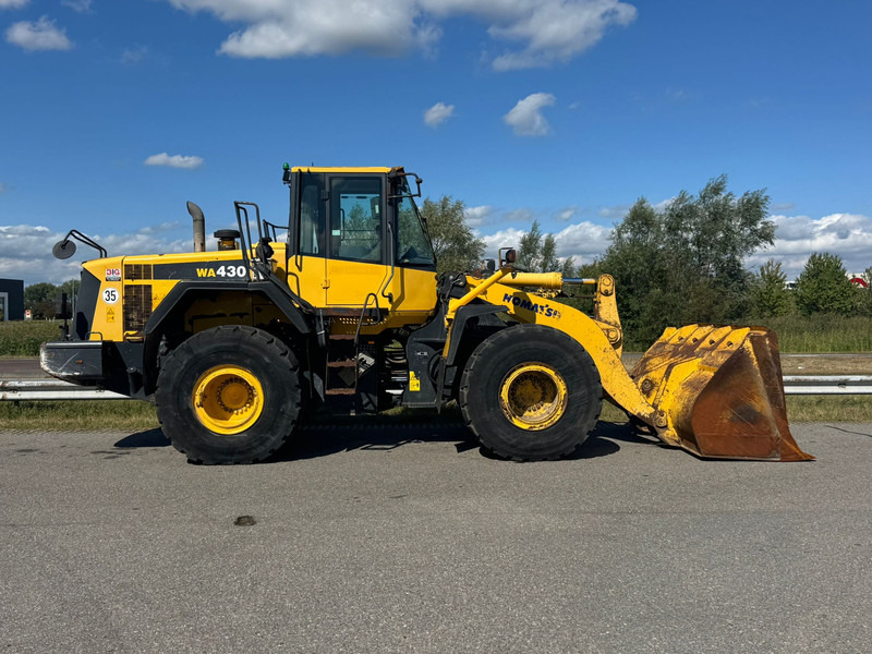 Komatsu WA430-6 - Gumikerekes homlokrakodó: 5 kép. Komatsu WA430-6 - Gumikerekes homlokrakodó: 5 kép.