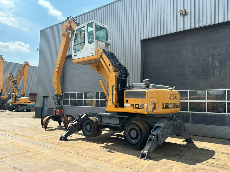 Liebherr A904C - Material Handler - Hulladék kotró: 3 kép. Liebherr A904C - Material Handler - Hulladék kotró: 3 kép.
