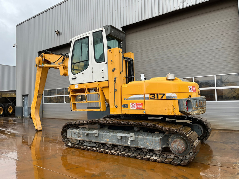 Liebherr R317 Litronic Material Handler - Hulladék kotró: 3 kép. Liebherr R317 Litronic Material Handler - Hulladék kotró: 3 kép.