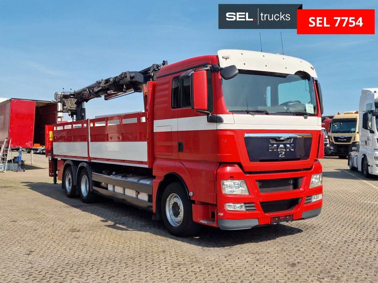 MAN TGX 26.400 6x2-2 BL/ Intarder / HIAB / Lenkachse - Darus autó: 3 kép. MAN TGX 26.400 6x2-2 BL/ Intarder / HIAB / Lenkachse - Darus autó: 3 kép.