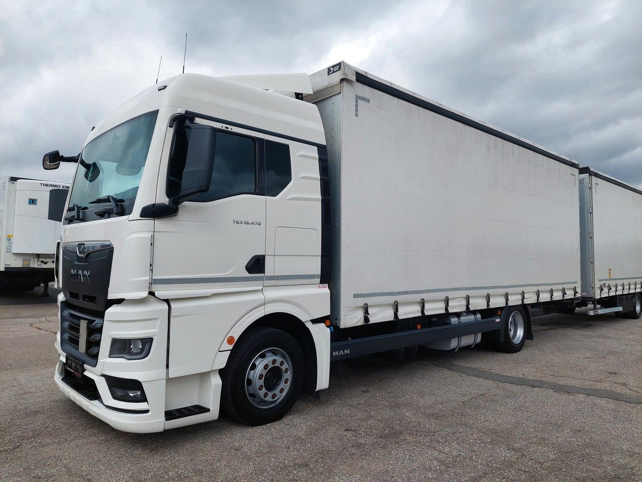 MAN TGX 18.470 LL + Gniotpol G-4080 120 m3 Durchbar - Ponyvás teherautó: 5 kép. MAN TGX 18.470 LL + Gniotpol G-4080 120 m3 Durchbar - Ponyvás teherautó: 5 kép.