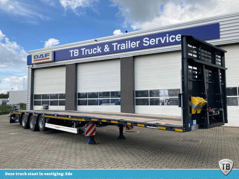 Kässbohrer SPS HM 3 / 0N - 18 / 27 Vlakke mega trailer met liftas, 18x rongen en kist voor de oprijplaten - Platós félpótkocsi: 1 kép. Kässbohrer SPS HM 3 / 0N - 18 / 27 Vlakke mega trailer met liftas, 18x rongen en kist voor de oprijplaten - Platós félpótkocsi: 1 kép.
