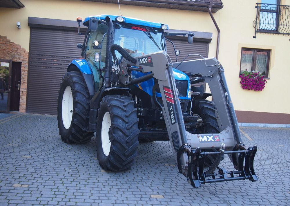 Ciągnik New Holland NH T6.140 2016 New Holland z Ładowaczem czołowym TUR - Traktor: 5 kép. Ciągnik New Holland NH T6.140 2016 New Holland z Ładowaczem czołowym TUR - Traktor: 5 kép.