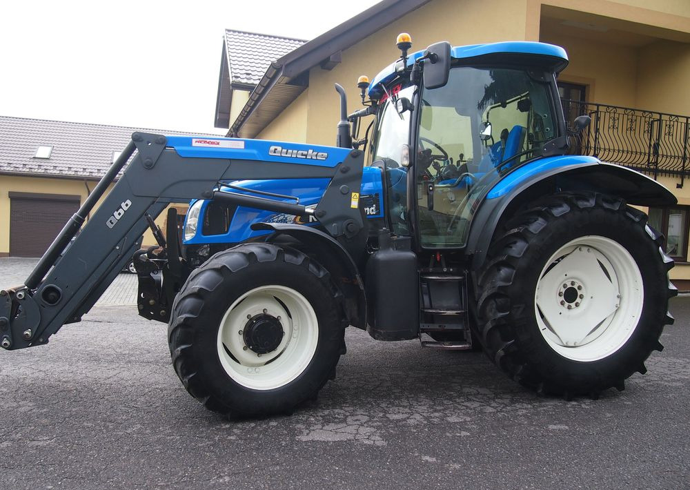 Ciągnik New Holland NH TS125A 6 cylindrów 2004 Ciągnik rolniczy New Holland TS125A - Traktor: 3 kép. Ciągnik New Holland NH TS125A 6 cylindrów 2004 Ciągnik rolniczy New Holland TS125A - Traktor: 3 kép.