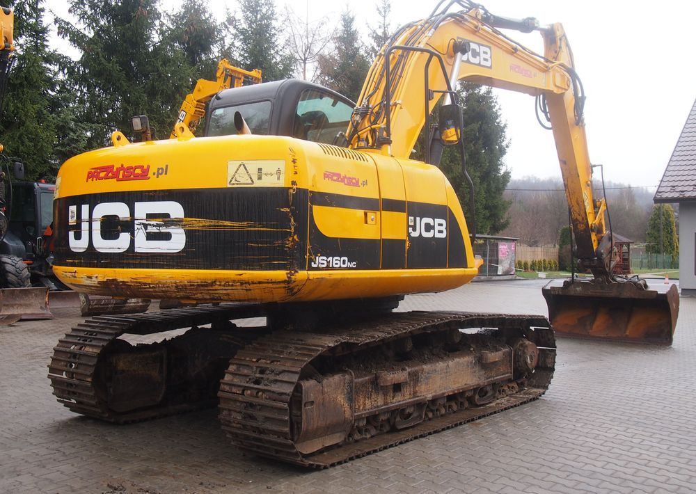 Koparka gąsienicowa JCB JS160LC 2011 - Lánctalpas kotró: 4 kép. Koparka gąsienicowa JCB JS160LC 2011 - Lánctalpas kotró: 4 kép.