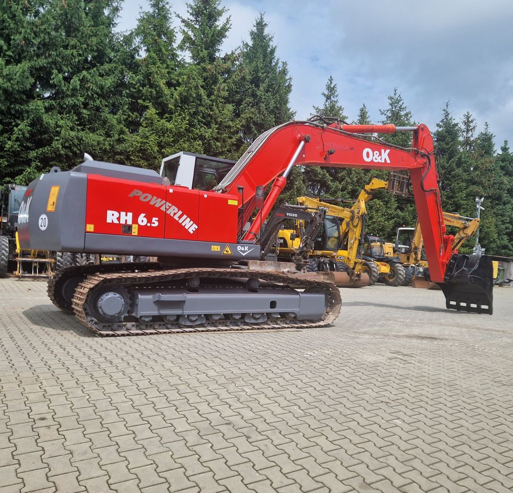 Koparka gąsienicowa O&K RH6,5 2003 Koparka gąsienicowa O&K - Lánctalpas kotró: 3 kép. Koparka gąsienicowa O&K RH6,5 2003 Koparka gąsienicowa O&K - Lánctalpas kotró: 3 kép.