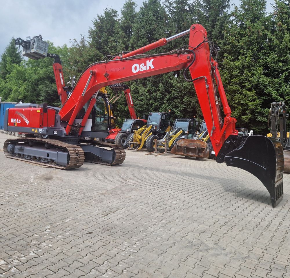 Koparka gąsienicowa O&K RH6,5 2003 Koparka gąsienicowa O&K - Lánctalpas kotró: 5 kép. Koparka gąsienicowa O&K RH6,5 2003 Koparka gąsienicowa O&K - Lánctalpas kotró: 5 kép.