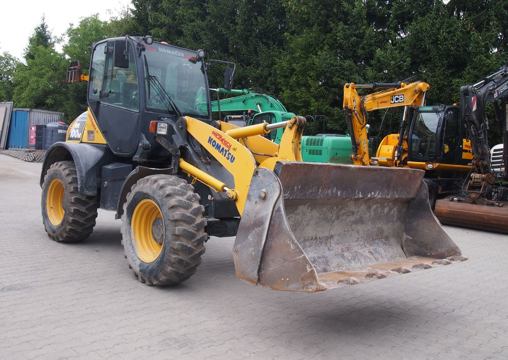 Ładowarka Komatsu WA100-6 2012 Ładowarka Komatsu WA 100-6 - Gumikerekes homlokrakodó: 2 kép. Ładowarka Komatsu WA100-6 2012 Ładowarka Komatsu WA 100-6 - Gumikerekes homlokrakodó: 2 kép.