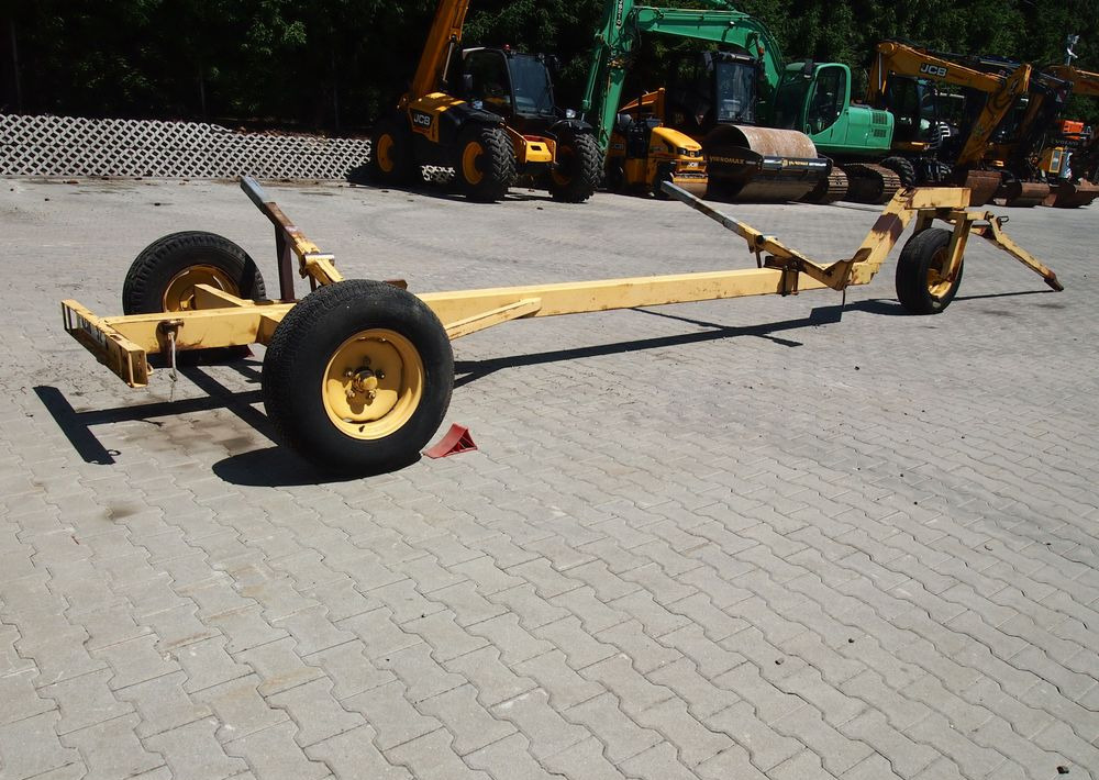 Wózek do kombajnu New Holland 3 kołowy Wózek pod heder do kombajnu - Adapter szállító kocsi: 1 kép. Wózek do kombajnu New Holland 3 kołowy Wózek pod heder do kombajnu - Adapter szállító kocsi: 1 kép.