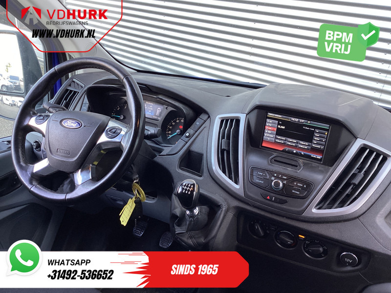 Ford Transit 2.0 TDCI 130 pk L2H2 Trend NL Auto/ 2xSchuifdeur/ Imperaal + Ladder/ Inrichting/ Cruise/ Camera/ Trekhaak/ PDC/ Airco - Kis furgon: 3 kép. Ford Transit 2.0 TDCI 130 pk L2H2 Trend NL Auto/ 2xSchuifdeur/ Imperaal + Ladder/ Inrichting/ Cruise/ Camera/ Trekhaak/ PDC/ Airco - Kis furgon: 3 kép.