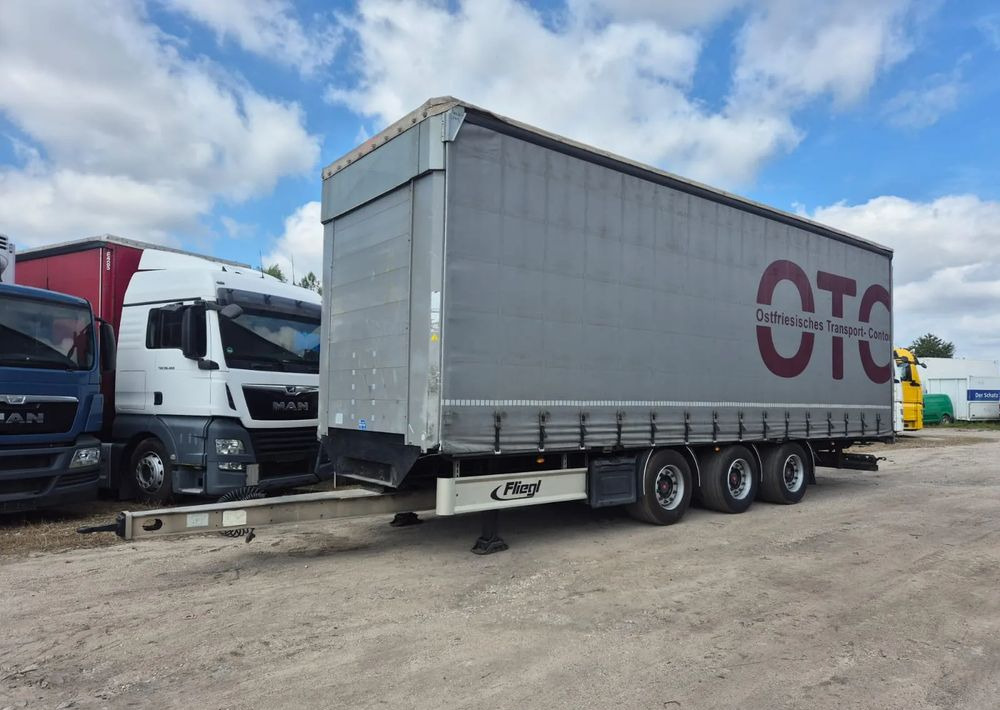 Fliegl Tandem 3 osie - Ponyvás pótkocsi: 1 kép. Fliegl Tandem 3 osie - Ponyvás pótkocsi: 1 kép.