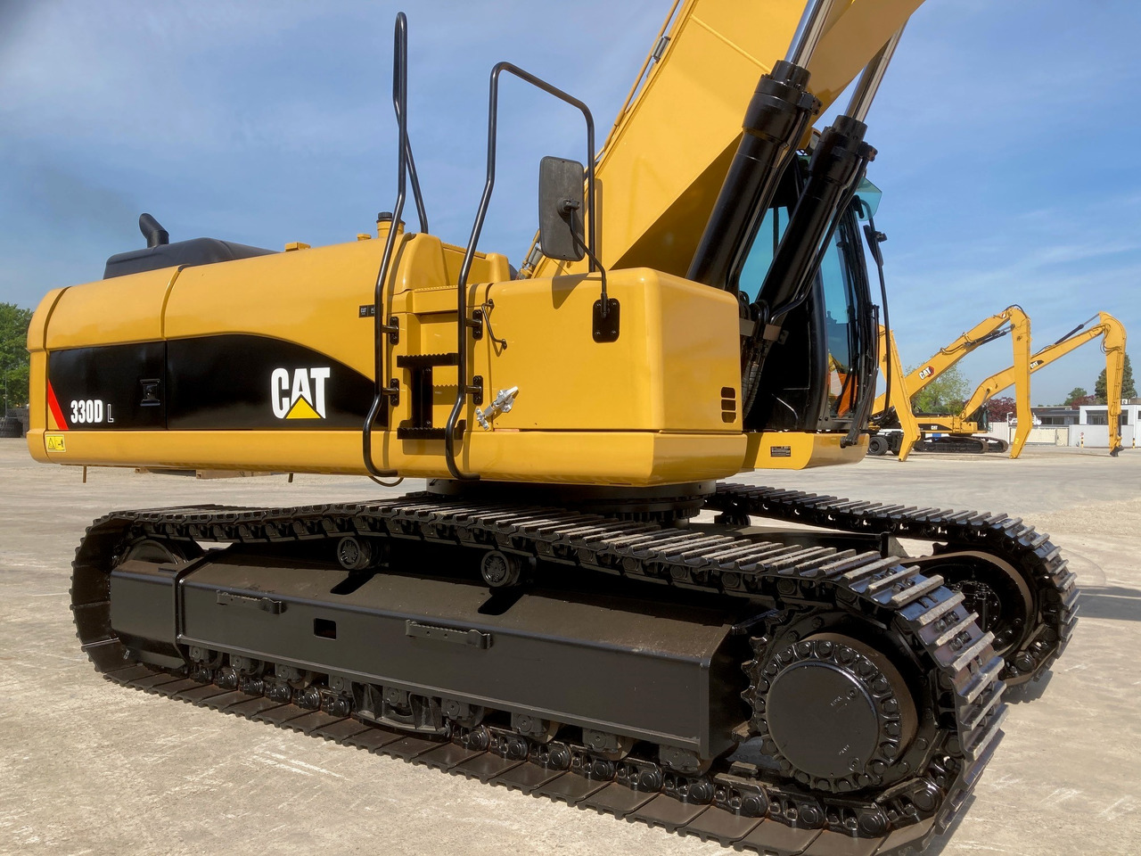Caterpillar 330DL - Lánctalpas kotró: 5 kép. Caterpillar 330DL - Lánctalpas kotró: 5 kép.