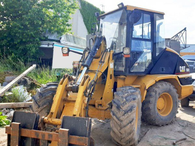 Caterpillar 908 (7t - Gumikerekes homlokrakodó: 2 kép. Caterpillar 908 (7t - Gumikerekes homlokrakodó: 2 kép.