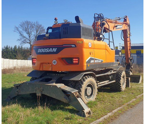 Doosan 18t DX165 WR-7 (DEVELON) - Gumikerekes kotró: 1 kép. Doosan 18t DX165 WR-7 (DEVELON) - Gumikerekes kotró: 1 kép.