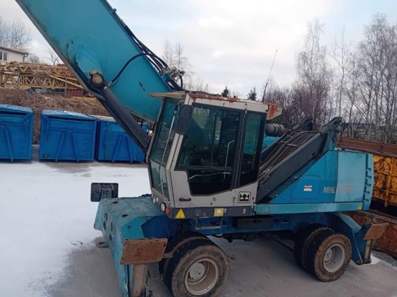 Fuchs MHL350 - Hulladék kotró: 3 kép. Fuchs MHL350 - Hulladék kotró: 3 kép.