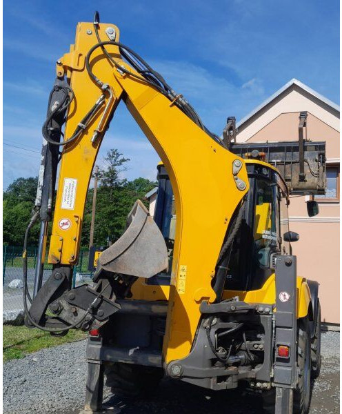 Mecalac TLB 990 - Kotrórakodó: 2 kép. Mecalac TLB 990 - Kotrórakodó: 2 kép.